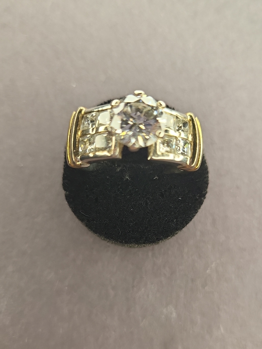 Gold Two-Tone Solitaire and Channel-Set Ring in White and Gold